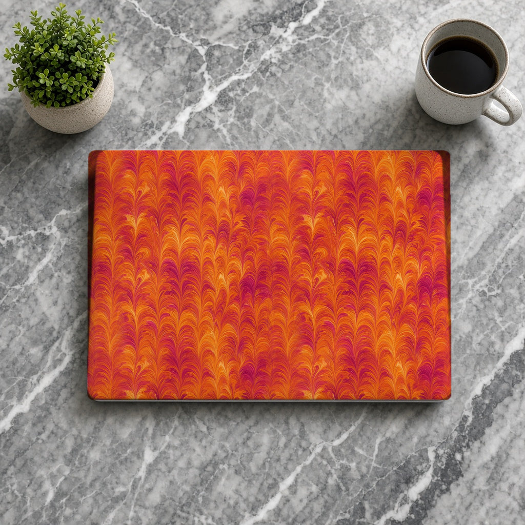 Sunset Feather Marbling matte MacBook case from above on grey marble with coffee