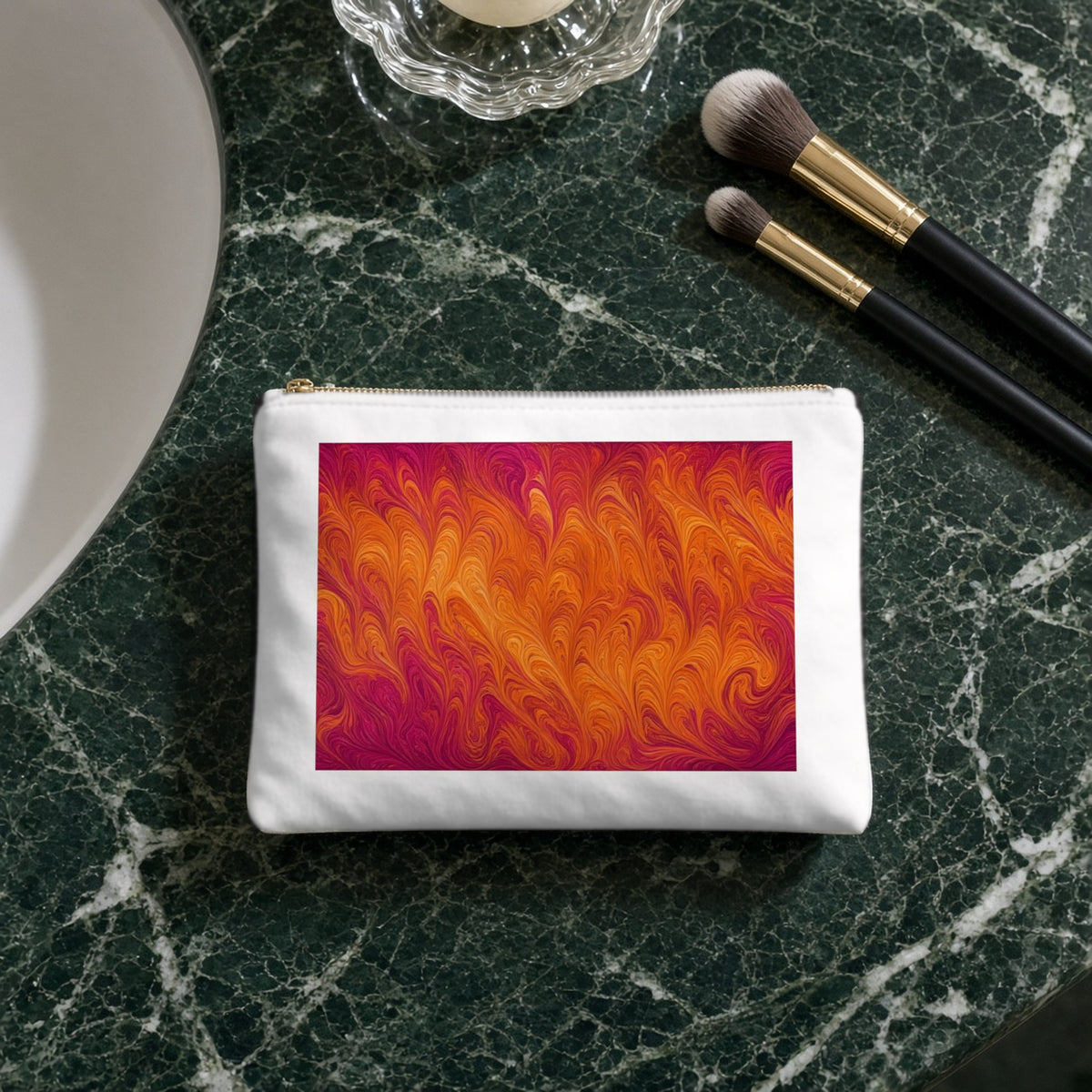 Sunset Feather Marbling canvas cosmetic bag on a green marble vanity