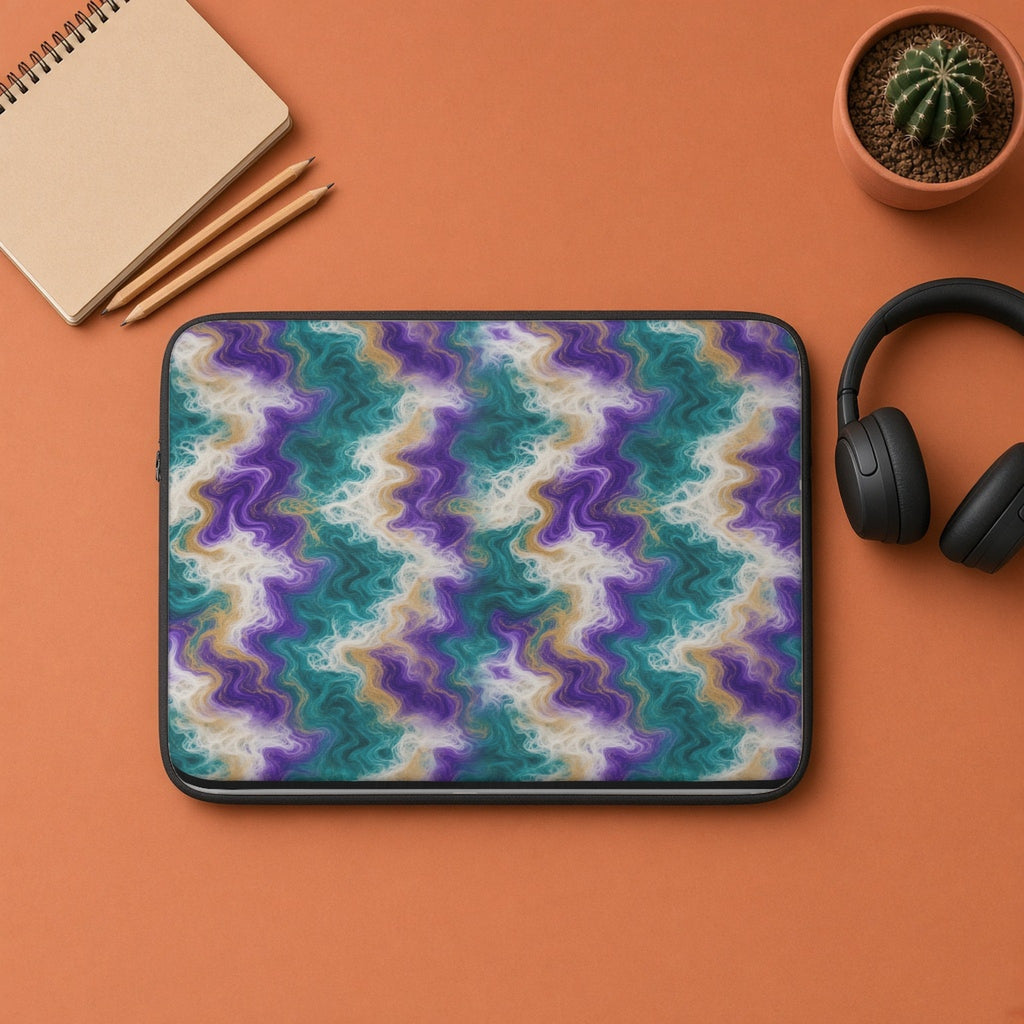 Peacock Resin Wave laptop sleeve flat lay on terracotta with headphones and a notebook
