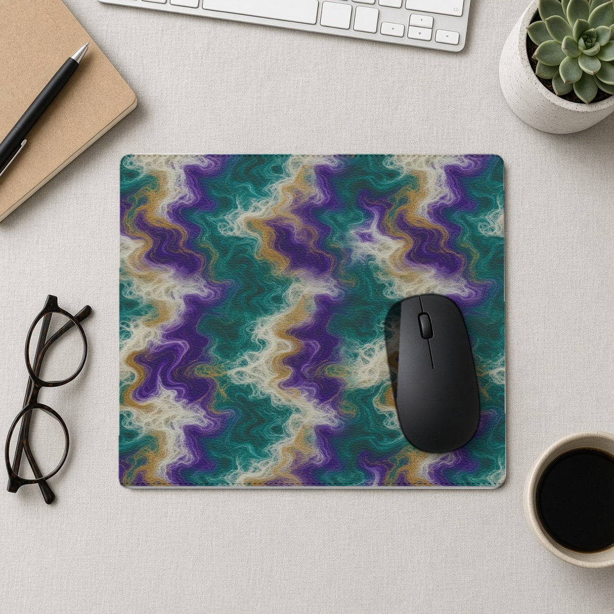 Peacock Resin Wave vegan leather mouse mat from above with a mouse, notebook and glasses