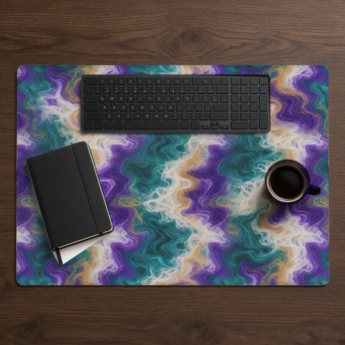 Peacock Resin Wave desk mat from above on walnut with a black keyboard, notebook and coffee