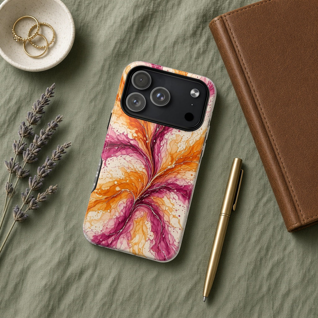 Sunset Ink Branches magnetic iPhone case flat lay on sage linen with a notebook and pen