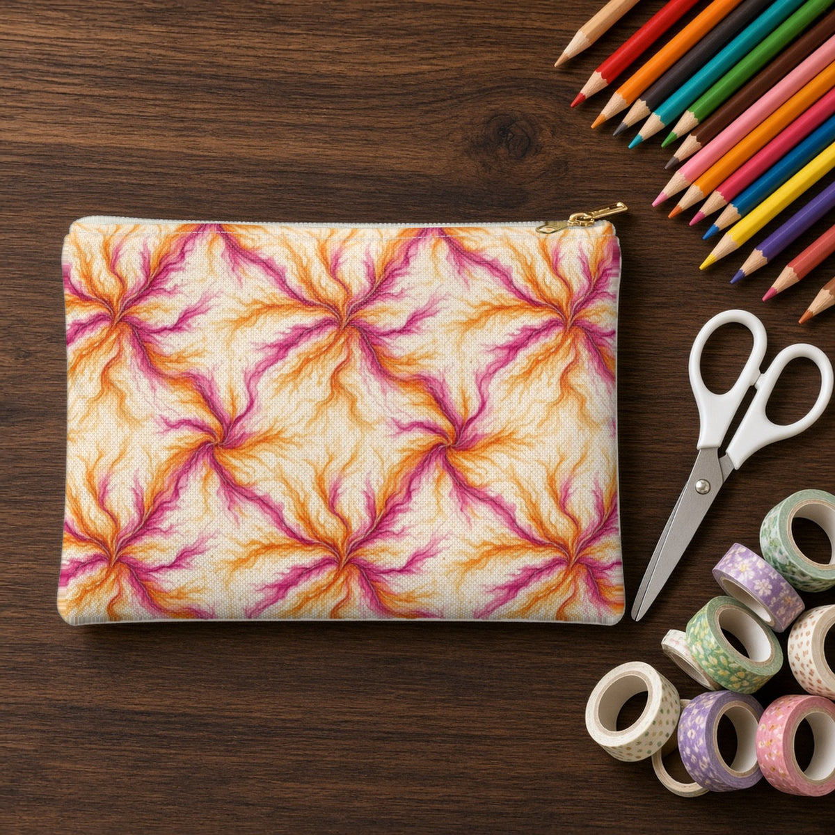 Sunset Ink Branches zip accessory pouch on a walnut desk with coloured pencils and washi tape