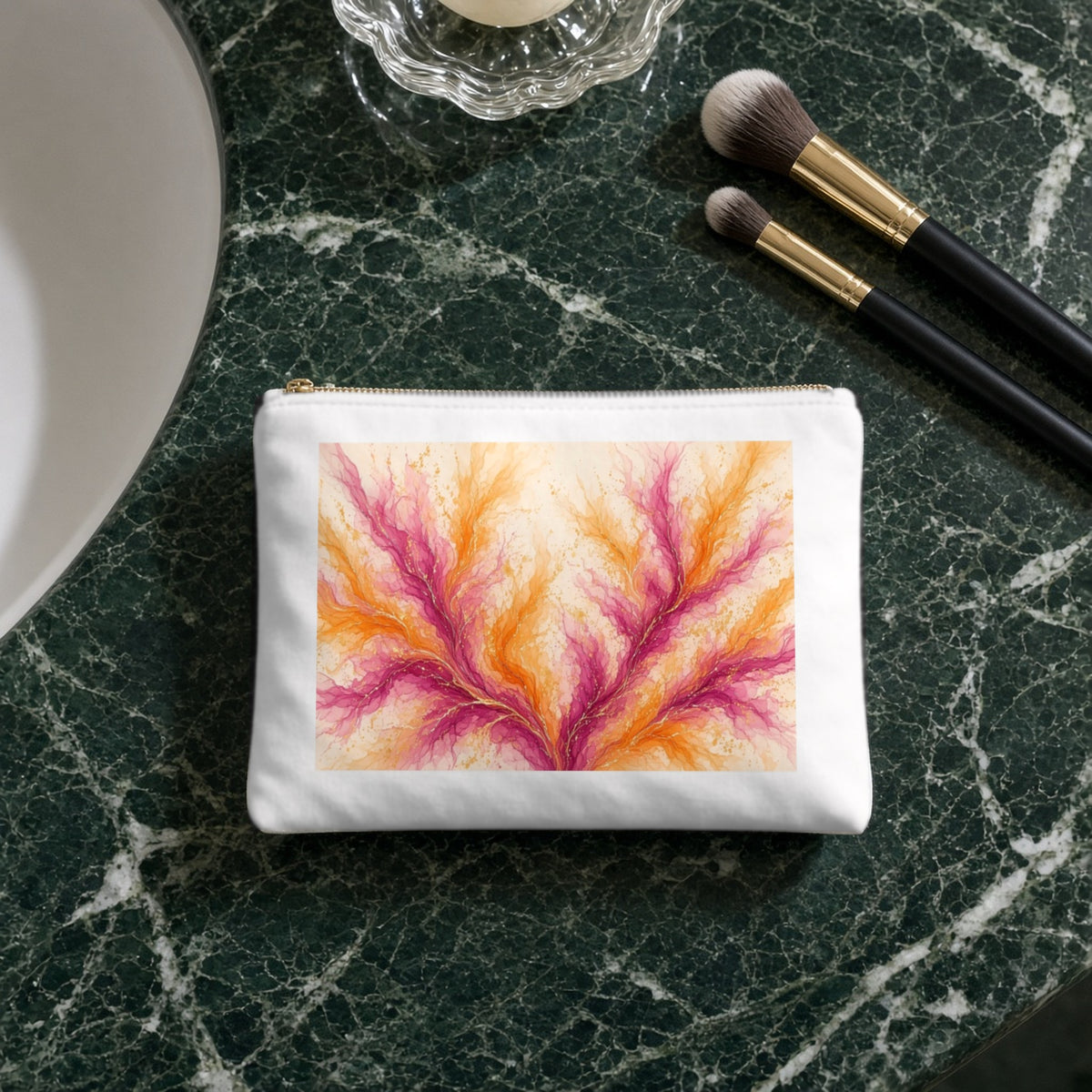 Sunset Ink Branches canvas cosmetic bag on a green marble vanity