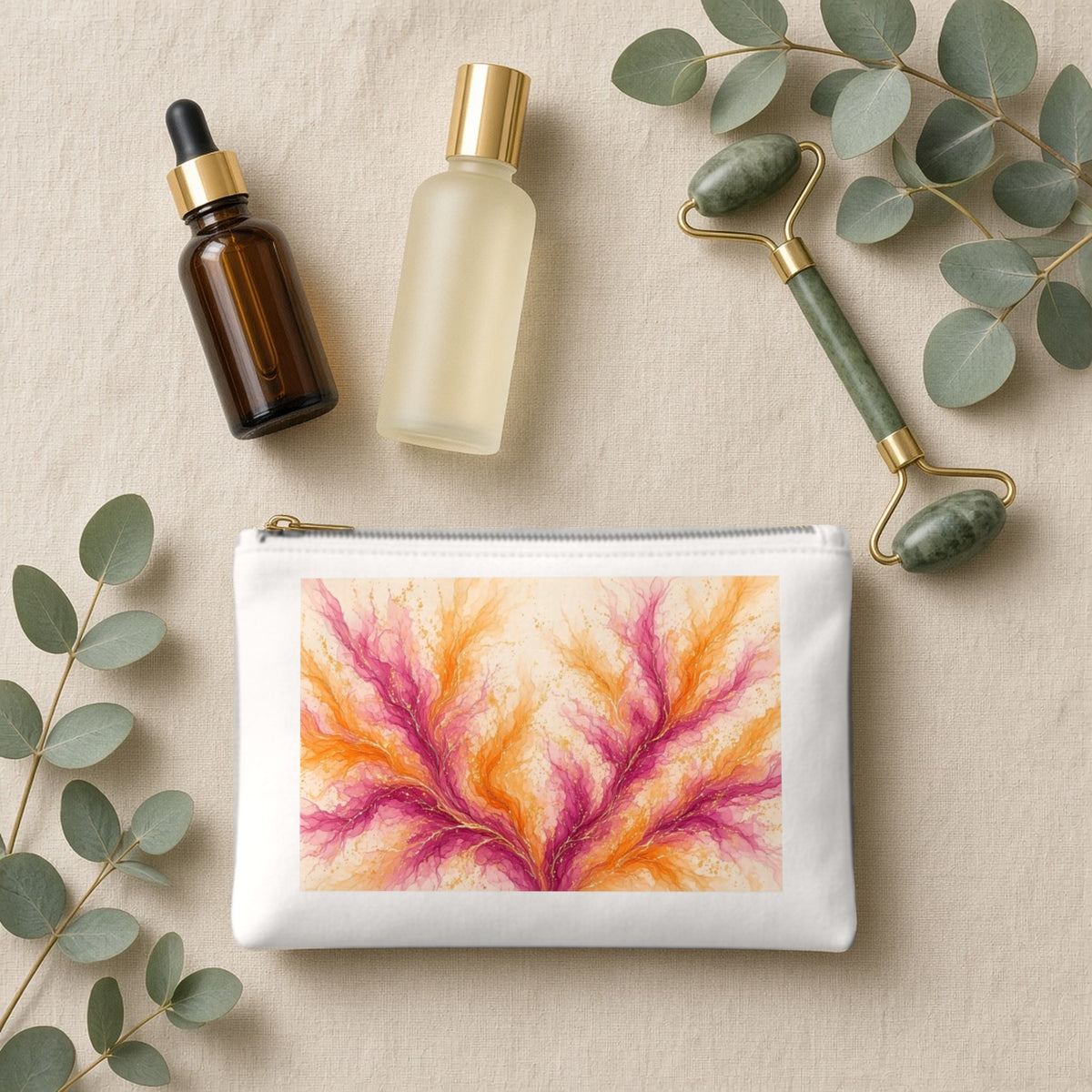 Sunset Ink Branches canvas cosmetic bag on beige linen with skincare bottles
