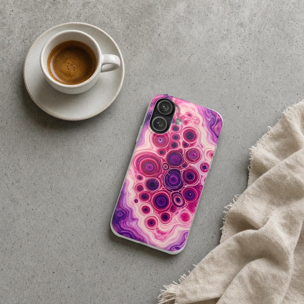 Berry Puddle Pour flexi phone case on a concrete cafe table with an espresso