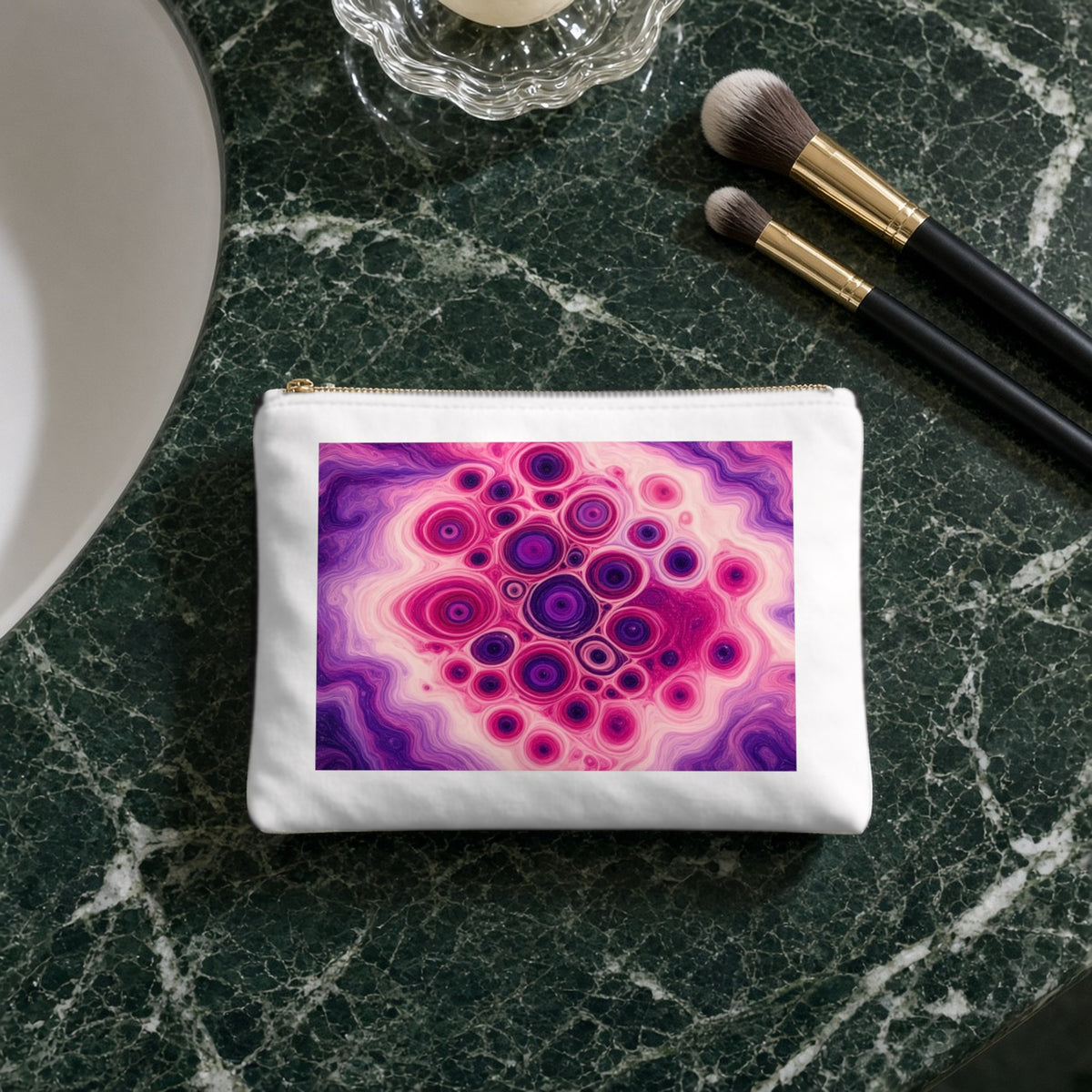 Berry Puddle Pour canvas cosmetic bag on a green marble vanity