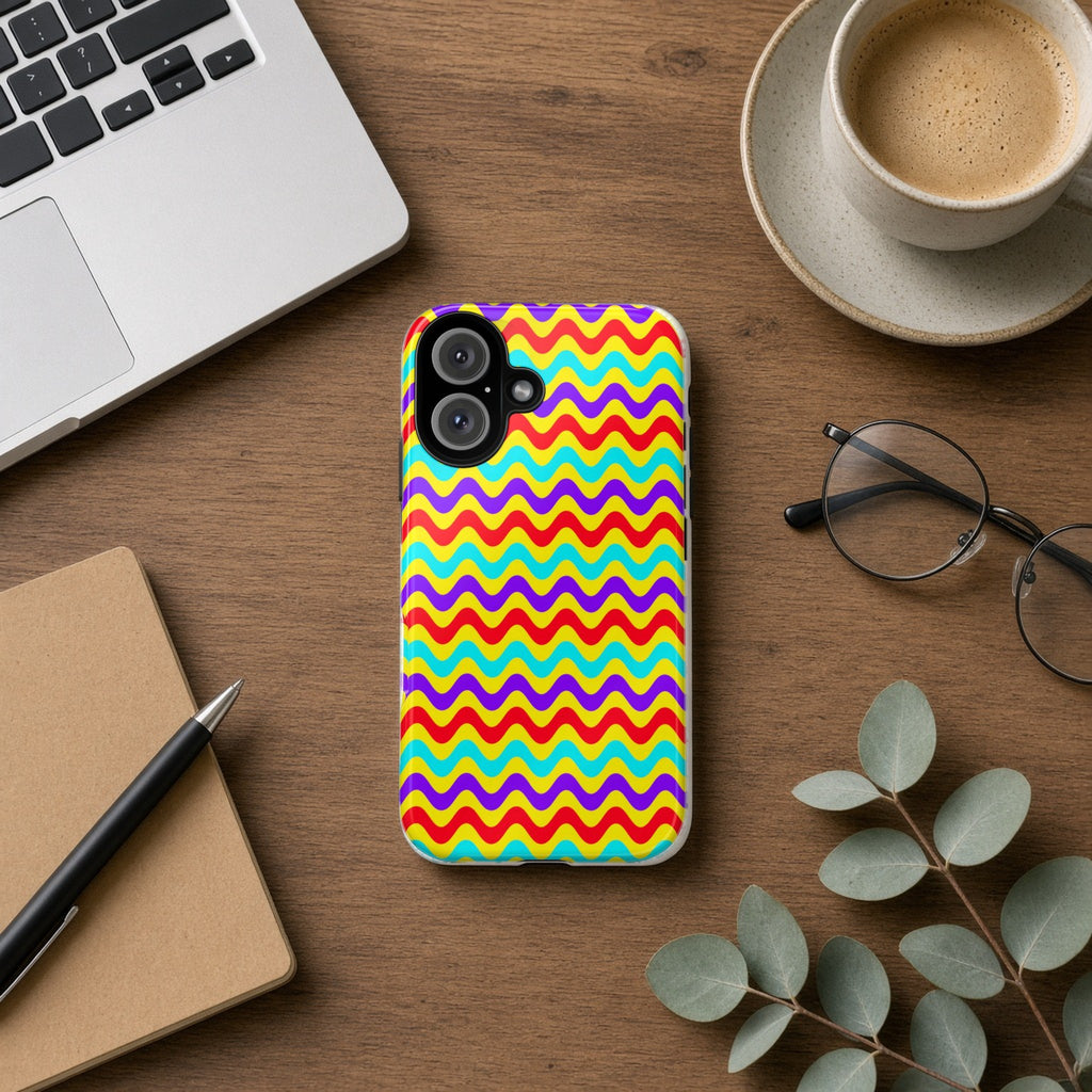 Big Ripple Chevrons tough phone case on a wooden desk beside a laptop, coffee and eucalyptus