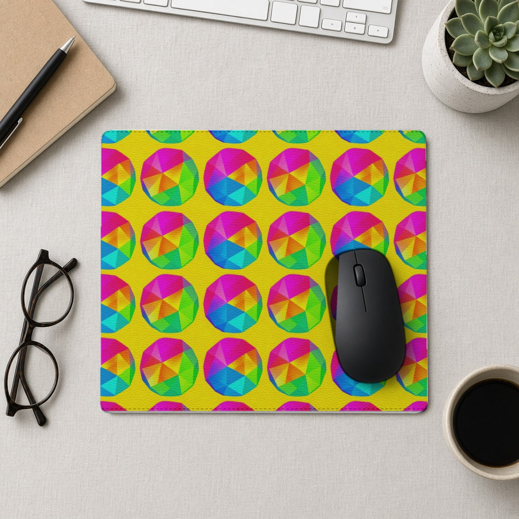 Holo Pebble Prisms vegan leather mouse mat from above with a mouse, notebook and glasses