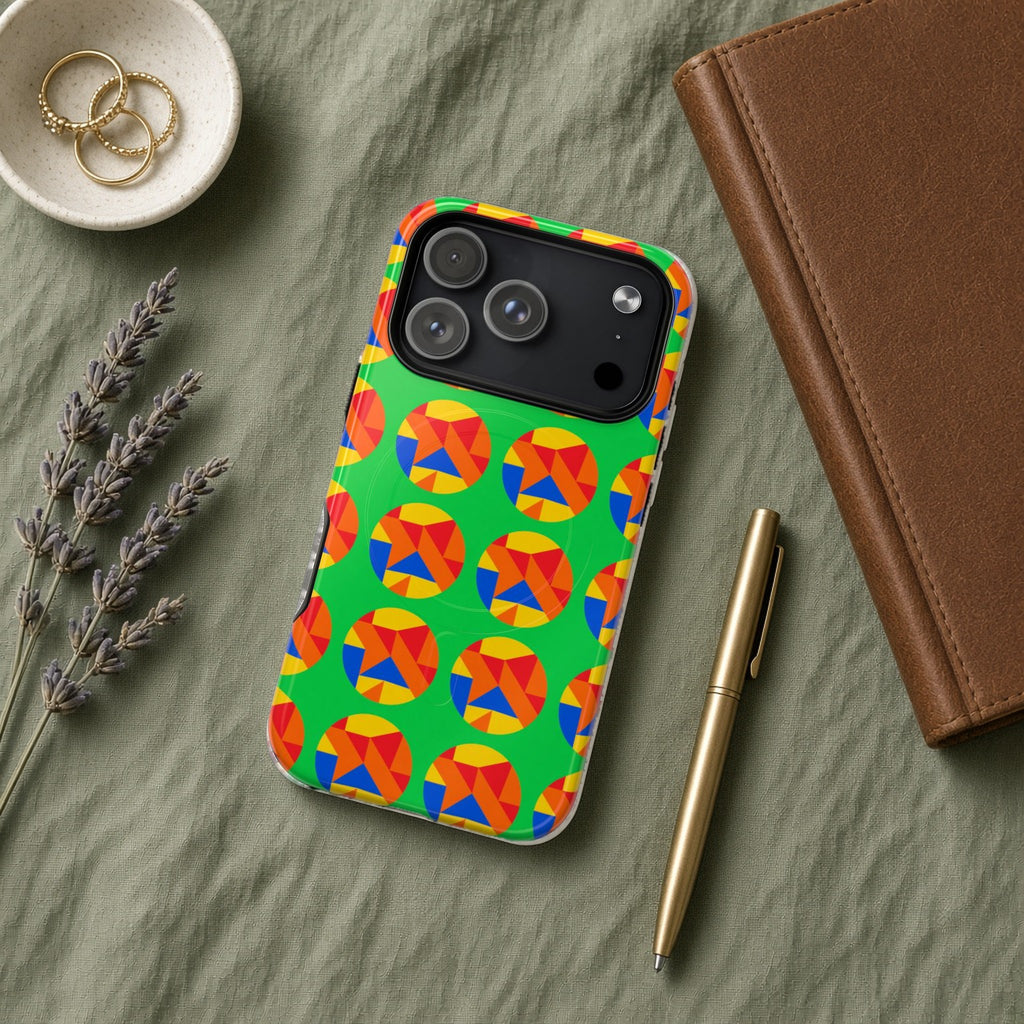 Broken Circle Planes magnetic iPhone case flat lay on sage linen with a notebook and pen