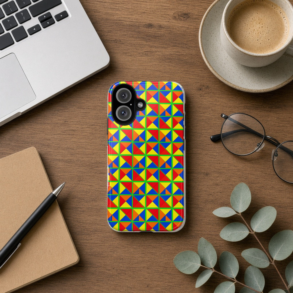 Split Square Fiesta tough phone case on a wooden desk beside a laptop, coffee and eucalyptus