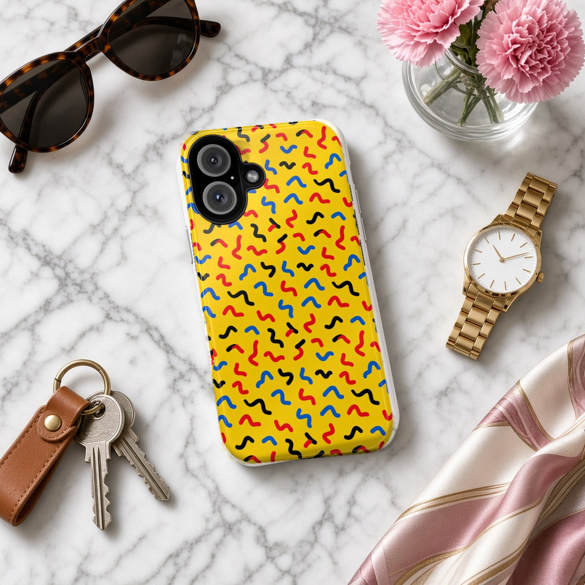 Squiggle Strokes Yellow tough phone case on white marble with a watch, keys and sunglasses