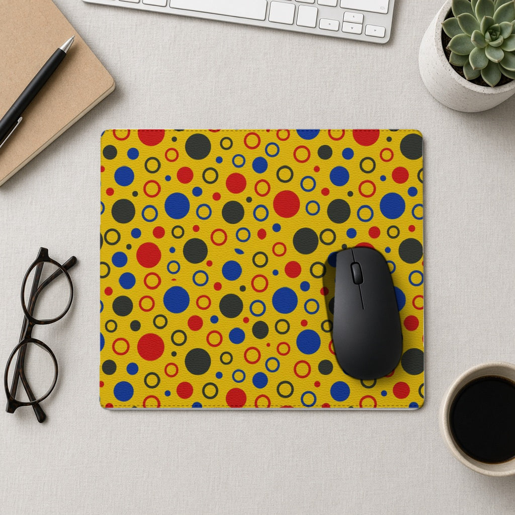 Bubble Outlines vegan leather mouse mat from above with a mouse, notebook and glasses