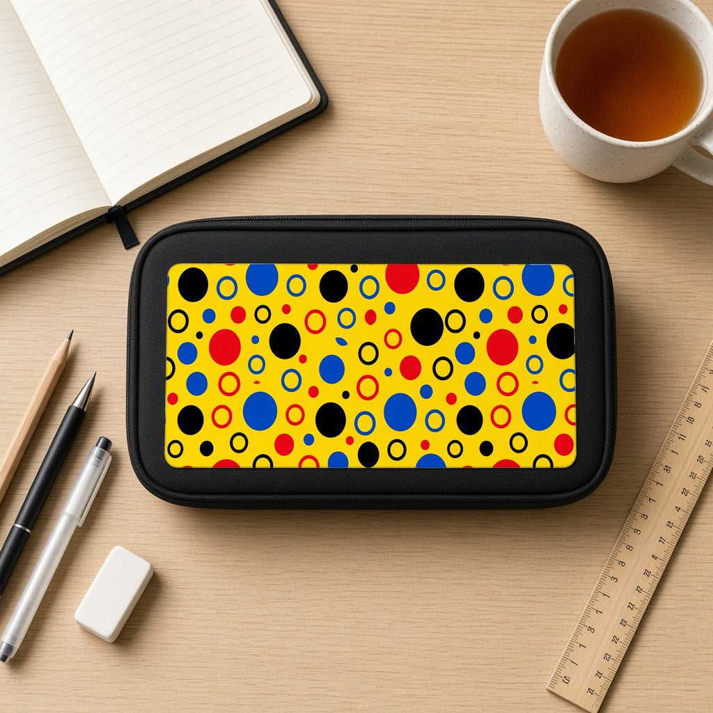 Bubble Outlines pencil case on a wooden desk with notebook, pens and a cup of tea